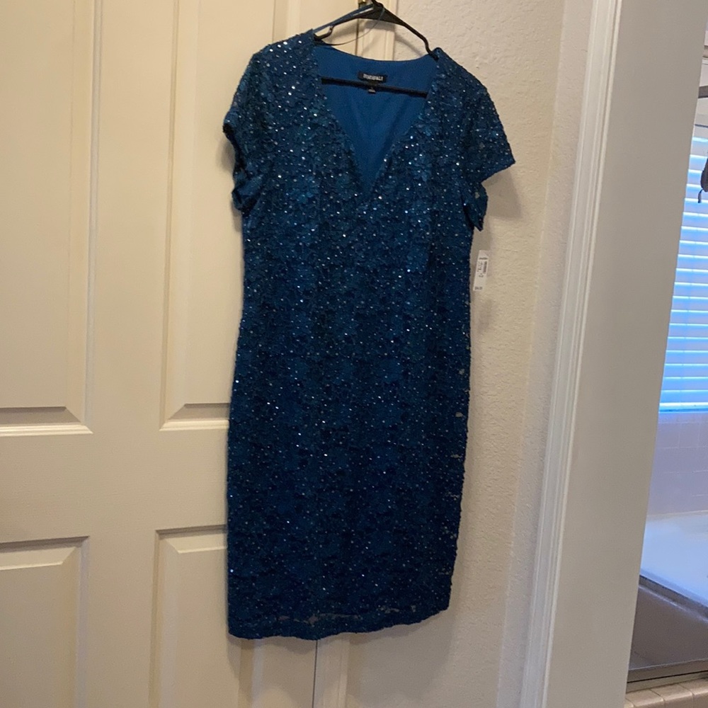 Teal sequin dress.